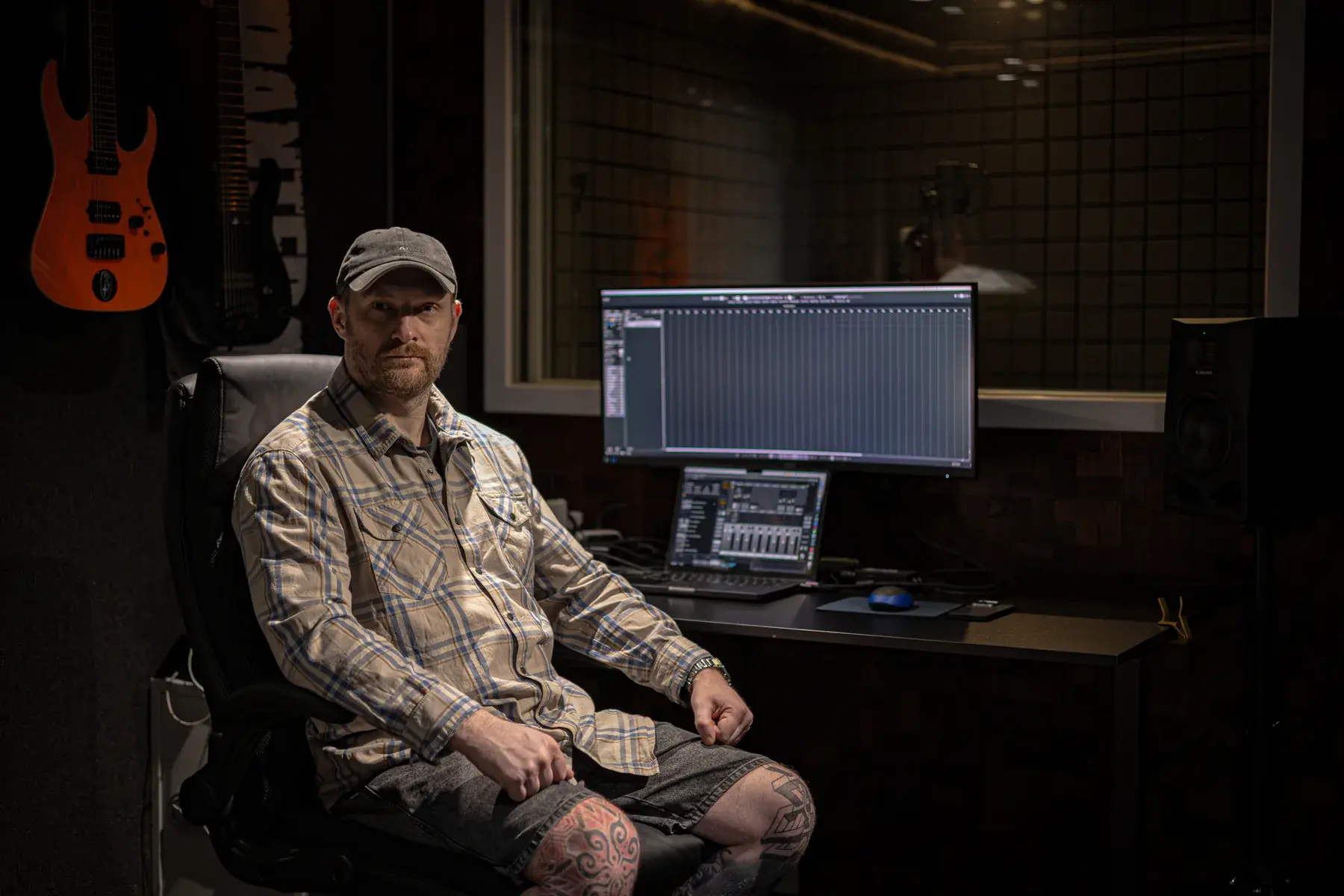 Oleksiy Sherhan with an electric guitar in the Velikhan Music Academy studio